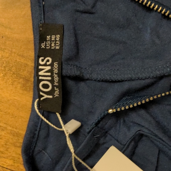 Cold shoulder, long sleeved, zippered front sexy, knit top.  Soft T-shirt fabric - Picture 3 of 9